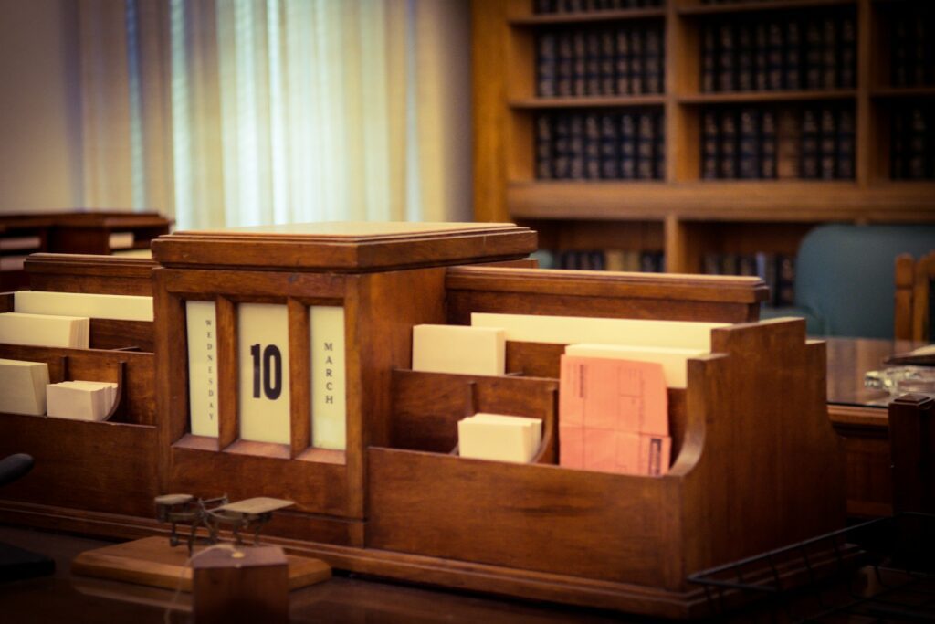 Quienes Somos a wooden model of a house
